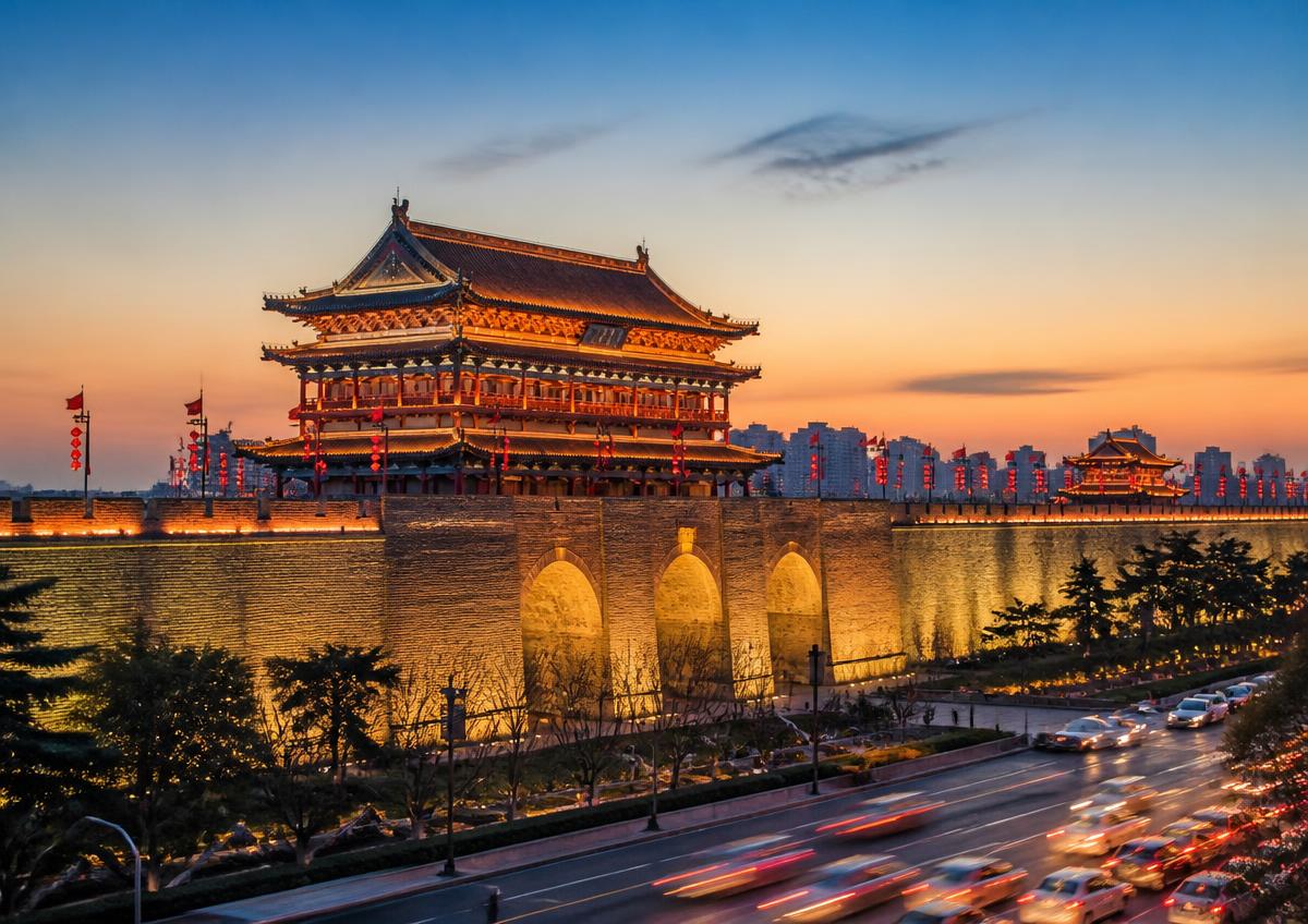 Xi'an, China — ancient city wall and gate tower at dusk